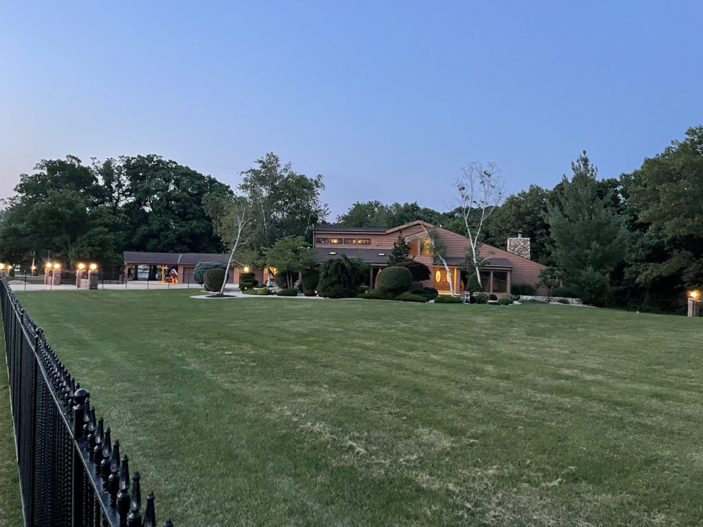 Twilight at the front of the property